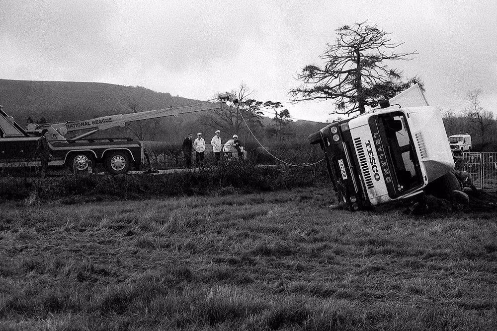 Tesco Lorry on its side being recovered by Air Bags and winch Tesco Lorry on its side being recovered